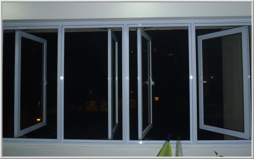 White aluminium framed outward opening windows